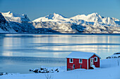 Red house by the Nordfjord, Skaland, Senja, Troms og Finnmark, Norway