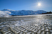 Icy sandy beach of Sandvika, Kvaloya, Troms og Finnmark, Norway