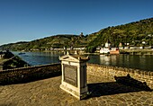 Historical monument on the banks of the Rhine to Blücher's campaign in 1813, in the background the old town of Kaub and Pfalzgrafenstein Castle, Upper Middle Rhine Valley, Germany