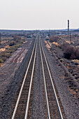 Railroad tracks in the Arizona desert.