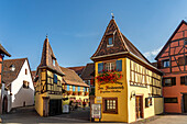 Half-timbered house of a winery in Eguisheim, Alsace, France