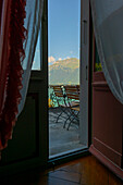 Balcony View from The Historical Grandhotel Giessbach with View over Mountain and Lake Brienz with Sunlight in Bern Canton, Switzerland.