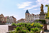 Žižkovo Náměstí with town hall, market fountain and monument to Hussite military leader Jan Žižka in Tábor in South Bohemia in the Czech Republic