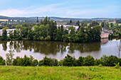 Convent lake and monastery area with convent church of the Assumption of Mary in Žďár nad Sázavou in the Bohemian-Moravian Highlands in the Czech Republic