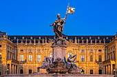 Frankonia Fountain in front of the Würzburg Residence at dusk, Würzburg, Bavaria, Germany