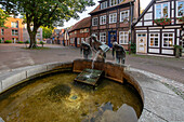 Nienburg, the asparagus fountain created in 1998 by Helge Michael Breig (11930-2020) symbolizes the importance of the city as a center for asparagus cultivation, Lower Saxony, Germany
