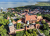 Cathedral Hill, Cathedral (Frauenburg Cathedral), Bishop's Palace (Stary Pałac Biskupi), High Tower (Wieża Radziejowskiego), Copernicus Tower (Wieża Kopernika) in Frombork (Frauenburg) and Fresh Lagoon (Zalew Wiślany) in Warmińsko-Mazurskie Voivodeship in Poland