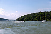 Water sports and boats on the Jezioro Beldanskie (Lake Beldahn) in Masuria (Mazury) in the Warmińsko-Mazurskie Voivodeship of Poland