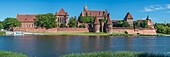 View over the Nogat to Marienburg Fortress, seat of the Grand Master of the Teutonic Knights between 1309 and 1454, Malbork, Poland