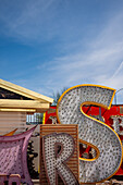 Abandoned and discarded neon signs in the Neon Museum aka Neon boneyard in Las Vegas, Nevada.