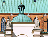 Figures of saints on the facade of the Cathedral of the Assumption of the Virgin Mary and St. Adalbert (Gniezno Cathedral; Archcathedral of Gniezno; Primate's Basilica of the Assumption of Our Lady; Bazylika archikatedralna Wniebowzięcia NMP) in Gniezno (Gniezno) in the Wielkopolska Voivodeship of Poland