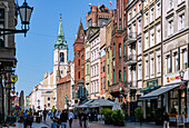 Szeroka Street to the Old Town Market (Rynek Staromiejski), Old Town Hall (Ratusz Staromiejski) and Church of the Holy Spirit (Kościół Ducha Świętego) in Toruń (Thorn, Torun) in the Kujawsko-Pomorskie Voivodeship of Poland