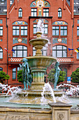 Town hall and fountain at Rynek in Chojnice (Konitz) in the Pomorskie Voivodeship of Poland