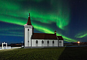 Church under the northern lights, Iceland
