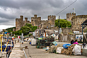 The smallest house in Britain at Fishermen's Quay and Conwy Castle in Conwy, Wales, United Kingdom, Europe
