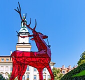 Town Hall Square (Rynek, Plac Ratuszowy) with red deer sculpture and Town Hall (Ratusz) in Jelenia Góra (Hirschberg) in the Giant Mountains (Karkonosze) in Dolnośląskie Voivodeship of Poland
