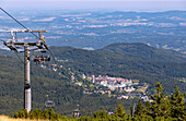Cable car (Kolej Linowa) from Karpacz to the Little Koppe (Mala Kopa) to the hiking trail to the Sněžka (Śnieżka; Sniezka) in the Giant Mountains National Park (Karkonoski Park Narodowy) and view of the hotel resort in Karpacz in the Dolnośląskie Voivodeship of Poland