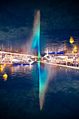 Doppelbelichtung des Jet d'eau, der Wasserfontäne im Genfersee, Genf, Schweiz