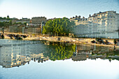Double exposure of the quays of the river Rhône in Lyon, France.