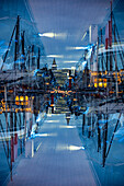 Double exposure of the yacht harbour of Marseille by  the twilight of dusk.
