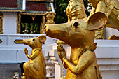 Rat statues guard the Buddhist temple Wat Phra That Si in Chom Thong, Thailand, Asia