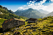 Alpine huts and mountains, sunset, La Caballar, Sotres, Picos de la Europa National Park, Cain, Castilla y León, Asturias, Northern Spain, Spain