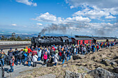 Brocken, tourists wait for the ride on the historic steam train to Werningerode; Harz, Saxony-Anhalt, Germany,