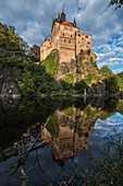 Kriebstein Castle reflected in the Zschopau River, Saxony, Germany,