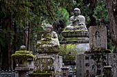 View of monks'39; tombs with statues in Okunoin Cemetery, Okuno-in, Koyasan, Koya, Ito District, Wakayama, Japan