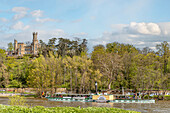 Historic steamship in front of Eckberg Castle, one of the three Elbe castles in the Elbe valley of Dresden seen from the opposite bank of the Elbe, Saxony, Germany