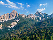 Aerial view of the Bosconero group with Sassolungo and Sfornioi Nord seen from Passo Cibiana, Province of Belluno, Alto Adige, South Tyrol, Alps, Dolomites, Veneto, Veneto, Italy