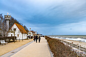  Baltic Sea border tower and the promenade in the Baltic Sea resort of Kühlungsborn in winter, Mecklenburg-Western Pomerania, Germany  