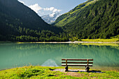  Bench at the Finkau reservoir, Durlassboden, Zillertal Alps, Salzburg, Austria 