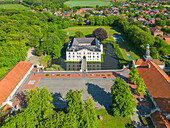  Aerial view of the Norderburg moated castle in Dornum, East Frisia, Lower Saxony, Germany 