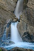  Waterfall flows through rocky gorge, Plaun Segnas Sut, Lower Segnesboden, Tectonic Arena Sardona, Glarus Thrust, UNESCO World Natural Heritage Glarus Alps, Glarus Alps, Graubünden, Switzerland  