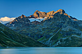  Silvretta reservoir with shadow peak in alpine glow, from the Bieler Höhe, Silvretta-Hochalpenstrasse, Silvretta, Vorarlberg, Austria 