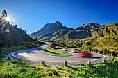  Cars drive through bends on the Silvretta High Alpine Road, Silvretta, Vorarlberg, Austria 