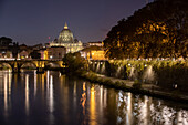  Nighttime view over the Tiber to St. Peter&#39;s Basilica, Rome, Italy 