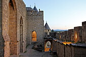  Evening atmosphere at the Porte de l&#39;Aude, Cité de Carcassonne, Aude department, Occitanie, France 