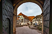  Gate to the bailiwick with the Nuremberg bay window, Wartburg, UNESCO World Heritage Site in Eisenach, Thuringia, Germany    