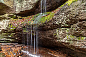  Ludwigsgrotte with waterfall in the Ludwigsklamm in Eisenach, Thuringia, Germany    