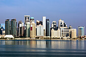  Harbor views, the Corniche with skyscrapers and ships in Doha, capital of Qatar in the Persian Gulf. 