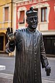  Statue monument of Don Camillo in front of church Santa Maria Nascente, village of Don Camillo and Peppone, Brescello, Emilia-Romagna region, Italy, Europe 