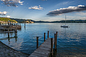  Wooden pier, view of Isola San Giulio from the harbor in Pella, Pella is a municipality on the western shore of Lake Orta in the Italian province of Novara, Lake Orta is a northern Italian lake in the northern Italian, Lago d&#39;Orta, or Cusio, region of Piedmont, Italy, Europe 