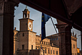  View through arcades of Palazzo dei Pio, Piazza dei Martiri, Carpi, Province of Modena, Region of Emilia-Romagna, Italy, Europe 
