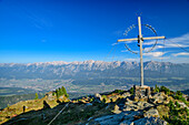  Summit cross of the Largoz with a view over the Inn Valley to the Karwendel range, Largoz, Tux Alps, Tyrol, Austria 
