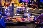  Sushi starter at the Japanese table in the Fusion Restaurant on board cruise ship Vasco da Gama (nicko cruises), at sea, near Indonesia 