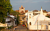 Street and house in historic town of Galle, Sri Lanka, Asia with Christian church and Buddhist temple
