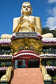 Giant Golden Buddha statue at Dambulla cave temple complex, Sri Lanka, Asia