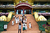 People at Dambulla Buddhist museum complex, Sri Lanka, Asia